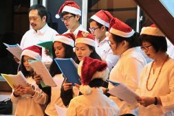 Carolers perform at the Church of Our Lady of Assumption Catholic Church on Christmas Eve 2018. Photo: Wardi Wasil/The Scoop