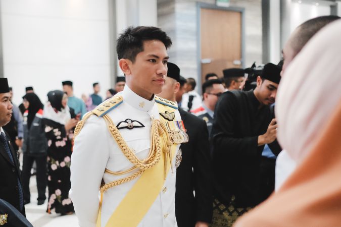 HRH Prince 'Abdul Mateen mingling with freshly commissioned officer cadets and their families after the Sovereign's Parade on January 17, 2019. Photo: Hazimul Harun/The Scoop