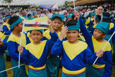 Young members of the national day performance pictured on the Taman SOAS field in the capital. Photo: Hazimul Wa'ie/The Scoop