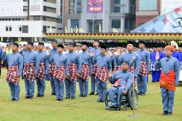 The oath readers for Brunei's 35th National Day celebration include two individuals with special needs. Photo: Infofoto