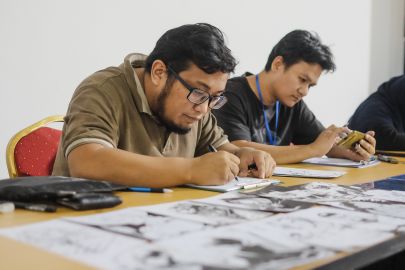 Comic book artist, Adi Farhan, drawing some sketches at the Infinity Convention held at RBRC. April 26, 2019. Photo: Hazimul Wa'ie/The Scoop
