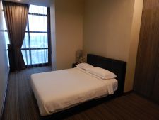 One of the rooms in the three-bedroom DAR Takaful Deluxe Premier Apartment. Photo: The Scoop/ Hadthiah Hazair